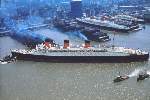 Queen_Mary_Tugs_Dock_in_NY_Harbor-1953